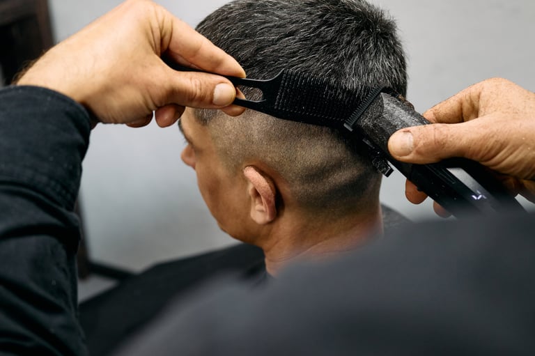 Expert barber creating a perfect fade